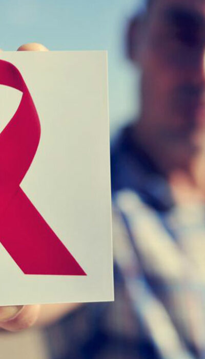 What are the causes and symptoms of AIDS?