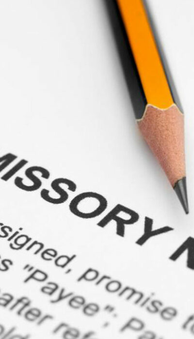 What should be included in a promissory note?