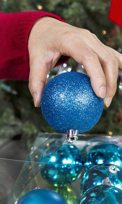 Tips for deciding if a Santa tree topper is right for your tree