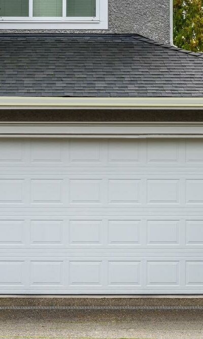 Vinyl and wooden garage door choices for modern houses